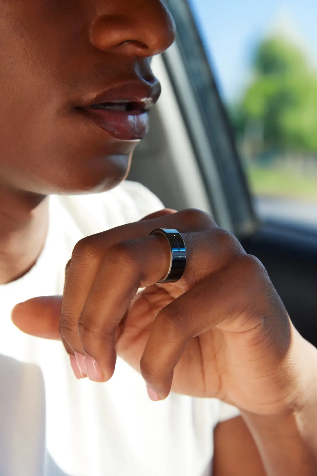 Man double-tapping Bless Ring to capture a prayer